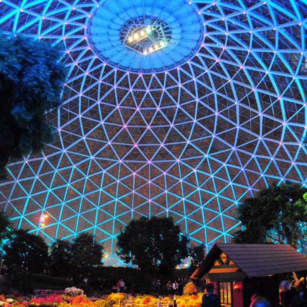 Picture of Milwaukee's Emerald Necklace's Mitchell Park's Domes at night; the show dome's interior.